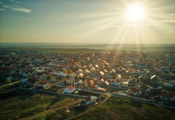 Sunset real estate suburb homes.