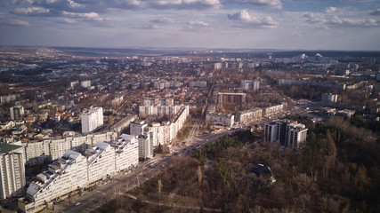 Fototapeta premium Aerial view of drone flying over city