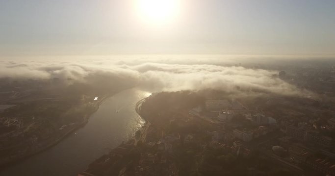 PORTO, PORTUGAL. Thick clouds over the Douro River. Deep valleys out of the land carved by the water.