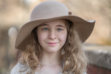 Portrait of a beautiful girl in a hat.