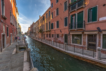 Venice street scene with romantic building canal