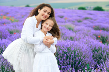 girls are in the lavender flower field, beautiful summer landscape