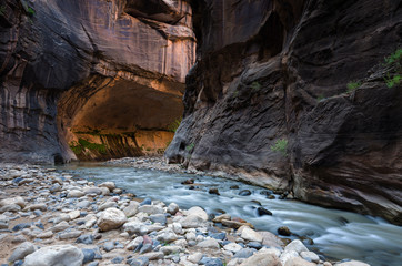 A hiking trail called The Narrows in the Zion National Park. The river is the Virgin river.