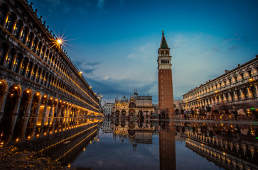 Fototapeta na wymiar A view of St. Mark's Square with Campanile and Doge's Palace at sunset time