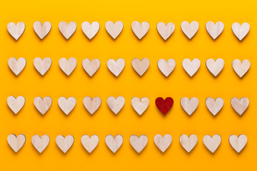 Happy Valentines day background. With small color hearts on yellow background.