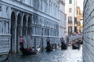 Venice street scene with romantic building canal and gondolas