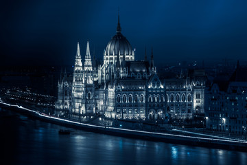 Fototapeta na wymiar Night view of famous Hungarian parliament building with Danube river