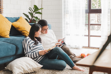 Lifestyle Asian couple man and woman talking working  spend time together at home, Asian couple family lifestyle concept