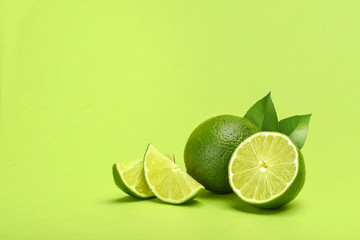 Limes on green background copyspace