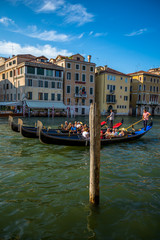Fototapeta premium Venice street scene with romantic building canal and gondolas