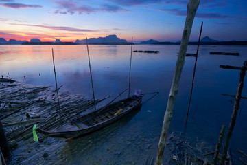 Beautiful sky in the morning during sunrise and fisherman longtail boat