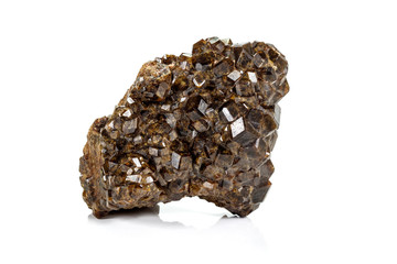 Macro stone Grossular mineral in rock on a white background