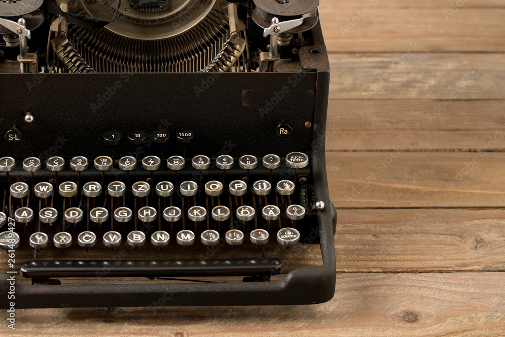 Poster top view of retro style typewriter in studio