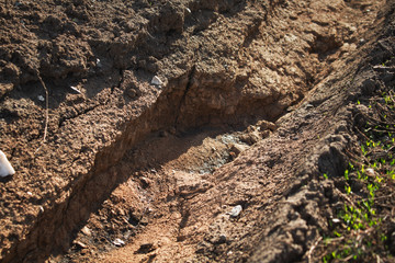 Clay ditch. Clay texture and background. Natural background. 