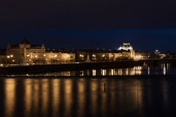 Obraz premium A view of Prague city scape with Charles bridge and Vltava river