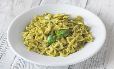 Portion of farfalle with pesto