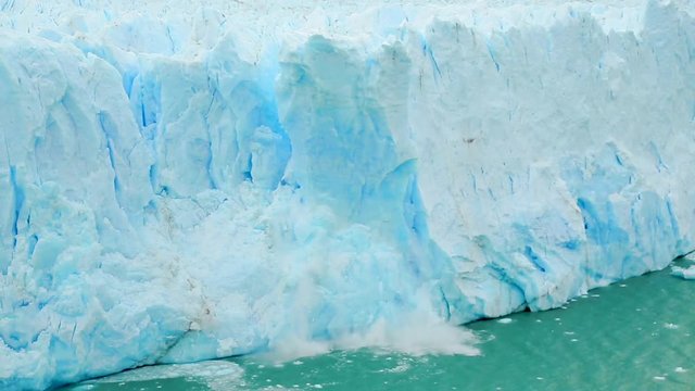 The Perito Moreno glacier in Los Glaciares National Park collapses into a large lake.
