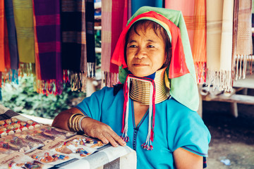 Long Neck Woman wearing at traditional costume. Tribal village Thailand.