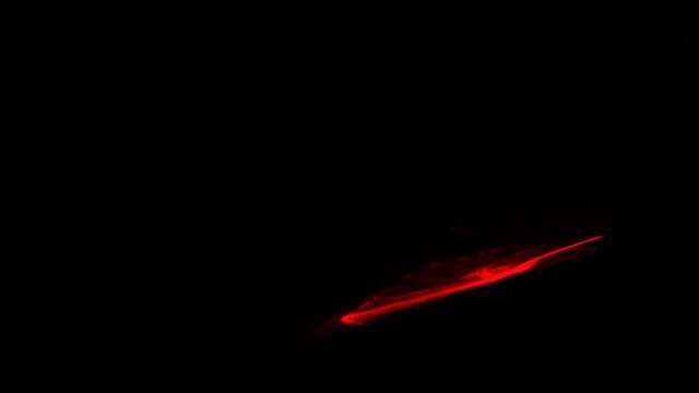 Red streaks light abstract animation background. Seamless Loop