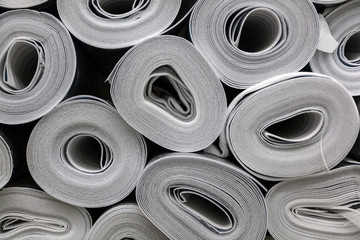 Close up roll of car insulation polyester fiber or felt background. Polyethylene Insulation...