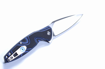 Knife in the unfolded form. Knife with a clip on the handle. Pocket knife.