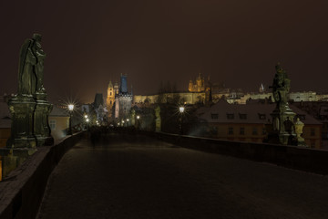 Fototapeta premium A view of Prague city scape with Charles bridge and Vltava river