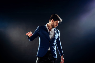 Fashion man posing in studio