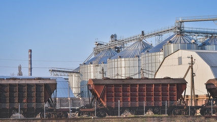 Loading grain at grain elevator.