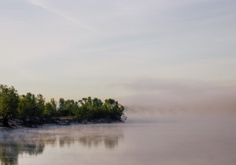 Fog on the river bank