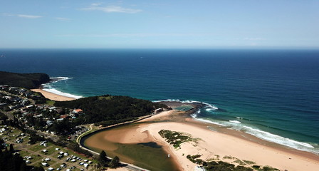 Aerial view of Narrabeen Lagoon, North Narrabeen Rockpool and Turimetta beach. Coast of Tasman sea in Sydney.