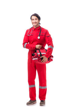Young paramedic in red uniform isolated on white 