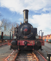 historic steam locomotive on a dead end track