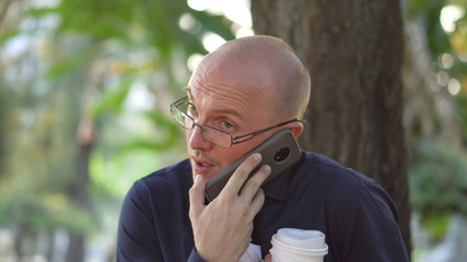 Overwhelmed Young High School Teacher Taking Call on Lunch Break