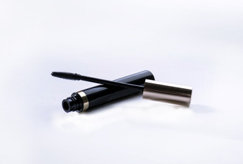 black mascara on white background