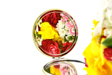 reflection of flowers in the mirror