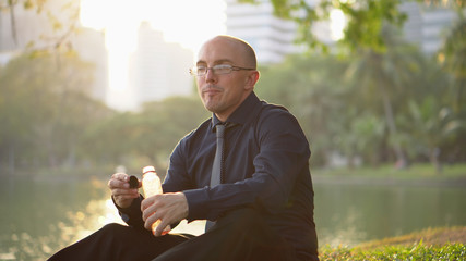 Healthy Lifestyle - Confident Man Drinking Healthy Smoothie in Park