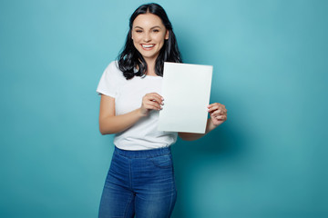 Woman holding white sheet 