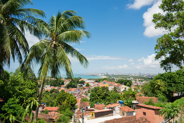 Fototapeta na wymiar A view of Olinda's historic center from the top of Alto da Se hill, Recife in the background - Pernambuco, Brazil