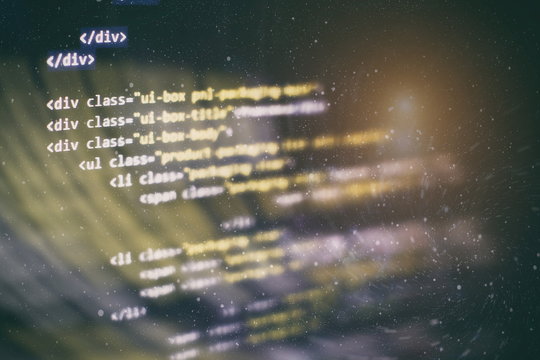 CSS, JavaScript and HTML usage. Monitor closeup of function source code. Abstract IT technology background. Software source code.