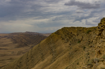 Fototapeta na wymiar View on the semi-desert and steppe slopes of Gareja Mountain, near to David Gareja Monastery in Georgia