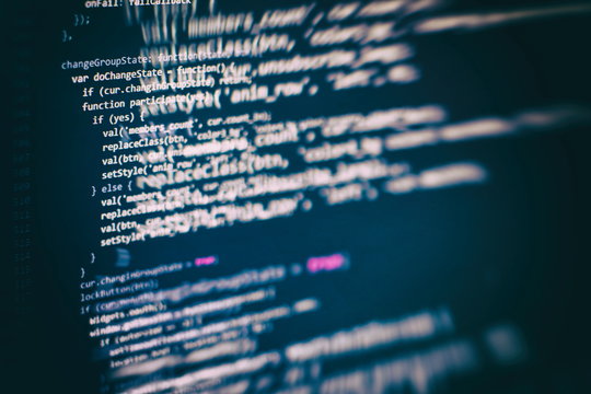 Closeup developing programming and coding technologies. Developer working on web sites codes in office.