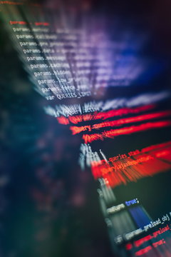 HTML5 in editor for website development. Website HTML Code on the Laptop Display Closeup Photo.