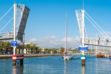 The Footbridge to the marina Lagos is as a modern drawbridge a landmark in the port