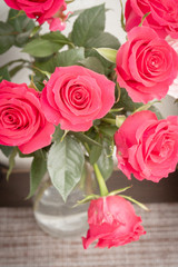 Beautiful lush red rose flower in full bloom