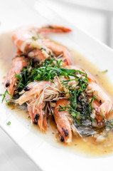 asian prawns sauteed in spicy garlic chilli and turmeric sauce