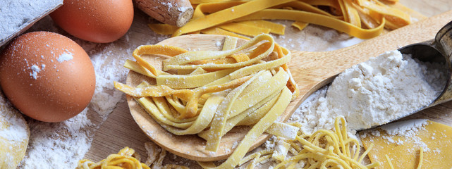 Fresh pasta homemade preparation, closeup view, banner