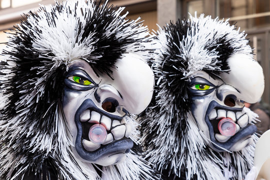 Freie Strasse, Basel, Switzerland - March 12th, 2019. Close-up of two beautiful black and white carnival masks