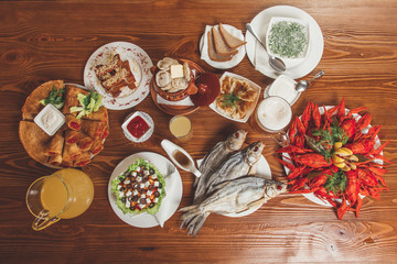 serving traditional Russian table with delicacies and treats.