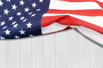 American flag on a white wooden wall