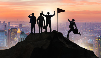 Businessmen in achievement and teamwork concept